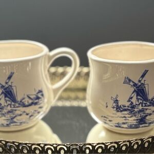 2 Vintage blue and white ceramic mugs or tankards with hand-painted windmills